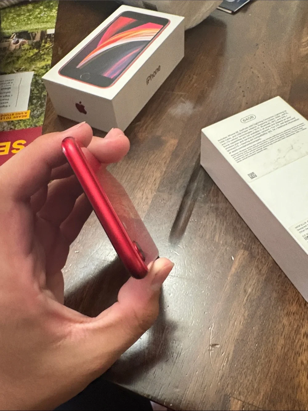 Apple iPhone SE in Red - Compact Touch ID Smartphone, Tiny crack in back.